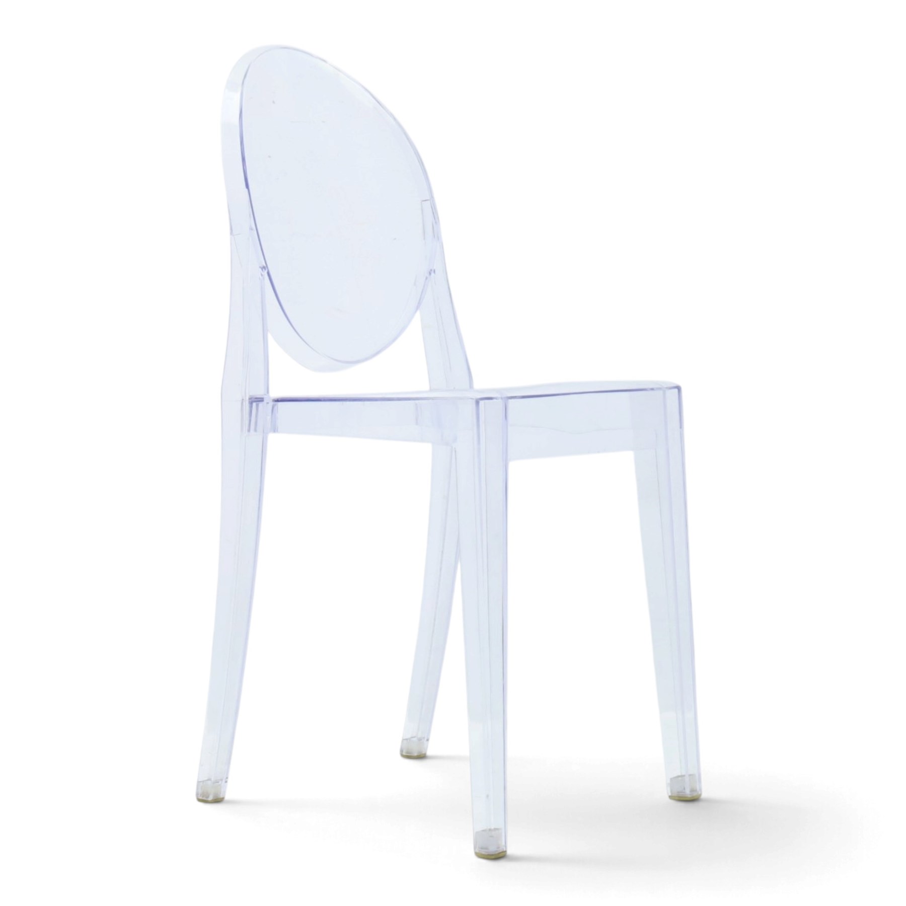 In the manner of Kartell Louis 'Ghost' chairs, transparent moulded plastic, with oval backs and shaped seats, raised on tapering supports