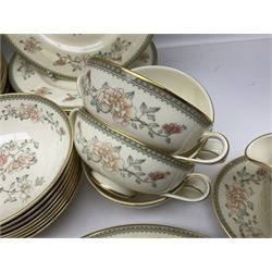 Minton Jasmine pattern tea and dinner wares, including dinner plates, sauce boats, side plates, bowls, teacups, coffee cans and twin handled soup bowls, etc (122)