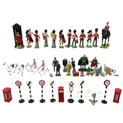 Over forty lead figures by Britains etc including QE11 on horseback, military bandsmen, sentry and box, carriage horses, Batman & Robin, telephone boxes, road signs, quantity of earlier railway platform and other figures etc; all unboxed