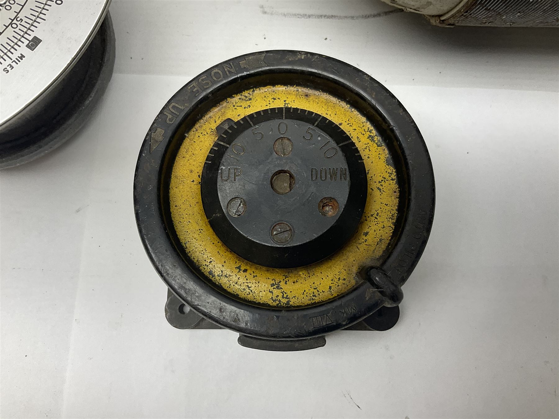 Three RAF light switches, together with military oxygen canister, batteries, gages etc  