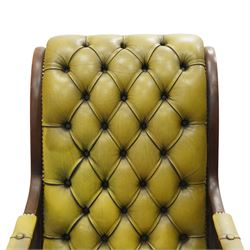 Regency design slipper chair upholstered in buttoned green leather, down swept arms with padded sections, swept back and shaped frames