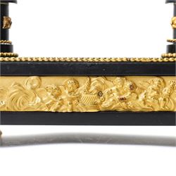 French-Early 19th century 8-day ormolu and polished black slate portico clock, case surmounted with a twin handled urn with flowers, supported by two square pedestals with finials and trailing floral mounts on oval bases, raised on an oval plinth with toupie feet, enamel dial signed 