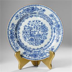 Pair of Chinese Kangxi period blue and white plates, painted in underglaze blue, decorated centrally with an unrolled handscroll revealing a shanshui landscape among foliage, D23cm (2)