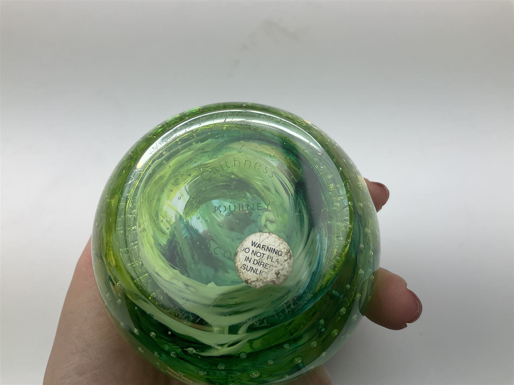 Caithness paperweights comprising 'Journey', 'Twirl', 'Blessings' and