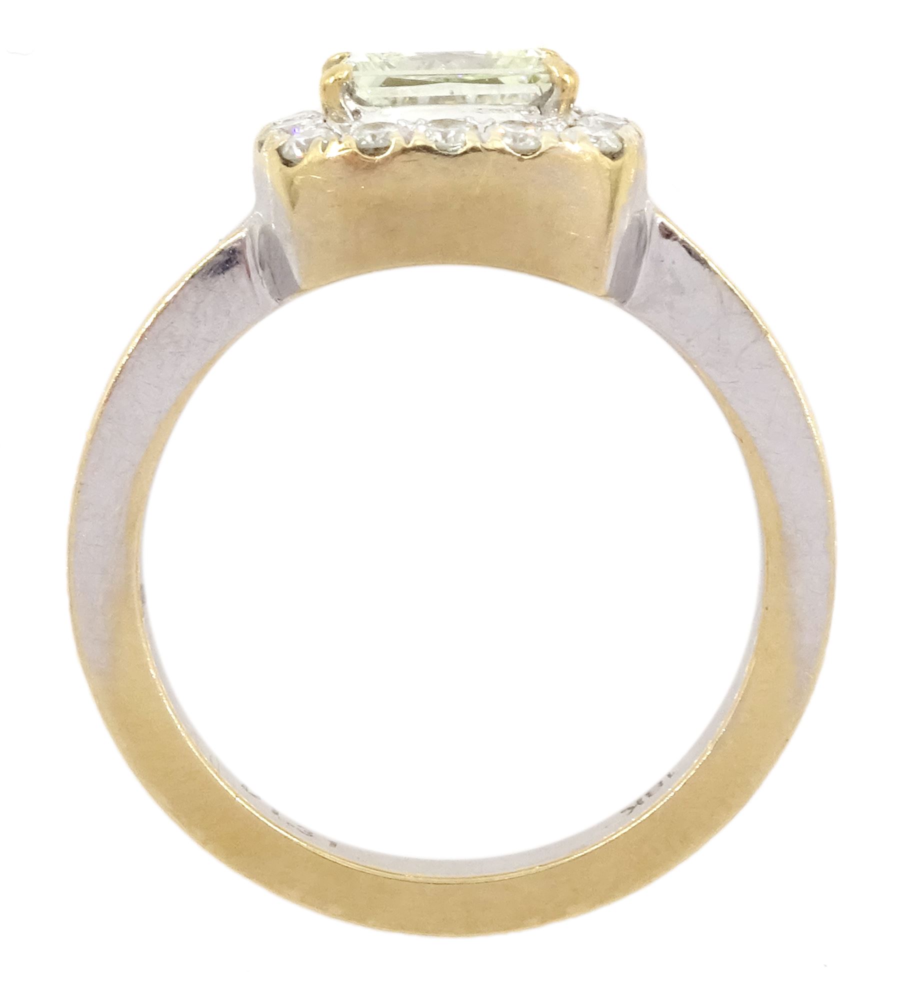 18ct gold diamond cluster ring, the central princess cut light yellow diamond of approx 1.00 carat, with round brilliant cut white diamond surround, total diamond weight 1.31 carat