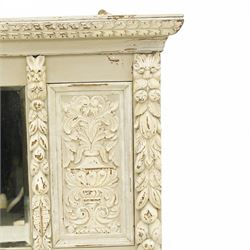 Victorian heavily carved oak wall mirror in distressed grey paint finish, moulded and chip carved cornice over central bevelled mirror and panelled front, the panels carved with urns and scrolled foliage, the uprights with fruiting foliage carved mounts 