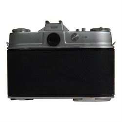 Kodak Retina Reflex camera outfit, comprising camera body serial no. EK 83509, six Schneider-Kreuznach lenses including Retina-Xenon f:2.0/50mm, Retina-Tele-Xenar f:4/135mm, Retina-Curtagon f:4/28mm and Retina-Longar-Xenon f:4/80mm, Retina-Curtar-Xenon f:4/35mm, Retina-Curtar-Xenon f:5.6/35mm, filters, platform and hood, contained within a tan Rowi carry case