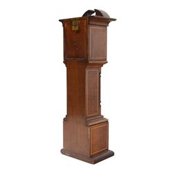 Edwardian mahogany and marquetry miniature longcase clock, the case with ogee top, over arched door flanked by turned columns, the base, door and top with classical urn and floral marquetry detail, housing goliath pocket watch, the white enamel dial with Roman numerals, chapter ring and subsidiary dial, and marked W. Thornhill & Co Ltd 144 New Bond St London, H38cm
