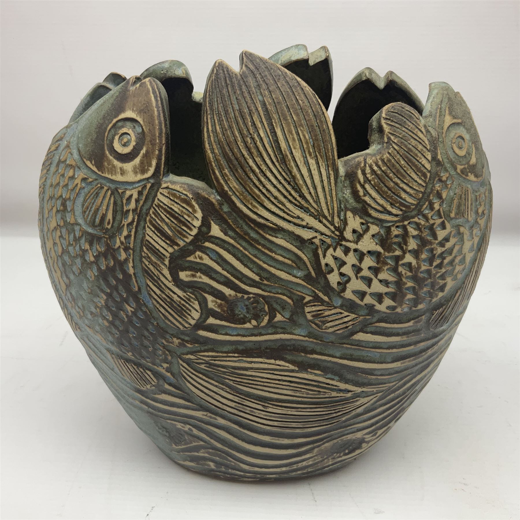John Egerton (c1945-): studio pottery stoneware vase, decorated with fish and ammonites, H24cm