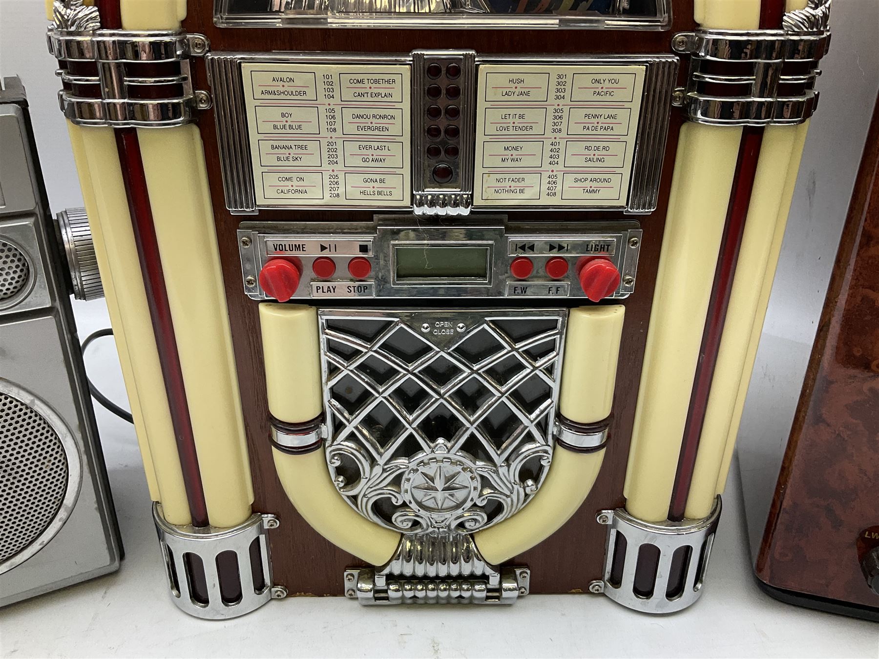 CD player in the form of a juke box, together with a Ferguson stereo and a vintage style radio