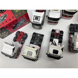 Eddie Stobart - three Oxford Die-Cast Super Rugby League lorries in perspex display cases including the two Hull Clubs; two Lledo Vanguard vans; two Days Gone vans; and Saico Truck & Trailer; all boxed; together with fourteen unboxed Corgi and other tractor/cab units etc (23)