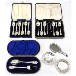  Set of six silver Coronation spoons by R Bond & Co, Sheffield 1935, Victorian silver Chistening spoon and fork, cast decoration by Joseph Rodgers & Sons Sheffield 1896 cased Set of 6 rat tail pattern coffee spoons and sugar tongs by Cooper Brothers & Sons  Sheffield 1927 miniature hand mirror and a pair of silver dishes with inset coins 9oz (excluding mirror)  