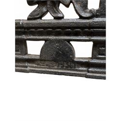 Yates Haywood - pair of Victorian cast iron bench ends, Architectural scrolling design with flower head detail, stamped with period registration number and date