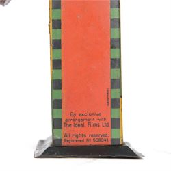 1930s Saalheimer & Strauss Mickey Mouse 'Smile Please' mechanical tin plate money box, depicting Mickey Mouse posing with folded hands to the front and verso as a photographer, above the motto 'If you only pull my ear you will see my tongue appear. Place a coin upon my tongue save your money while you're young', marked to one side 'By exclusive arrangement with Ideal Films Ltd. All rights reserved. Registered No 508041', with key, H17cm

