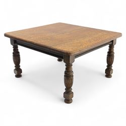 Victorian oak extending dining table, rectangular moulded top with figured grain pattern and wind-out action operated by removable crank handle, complete with additional leaves, raised on four boldly turned and reeded baluster supports terminating in squat bun feet (Extends to 238cm)