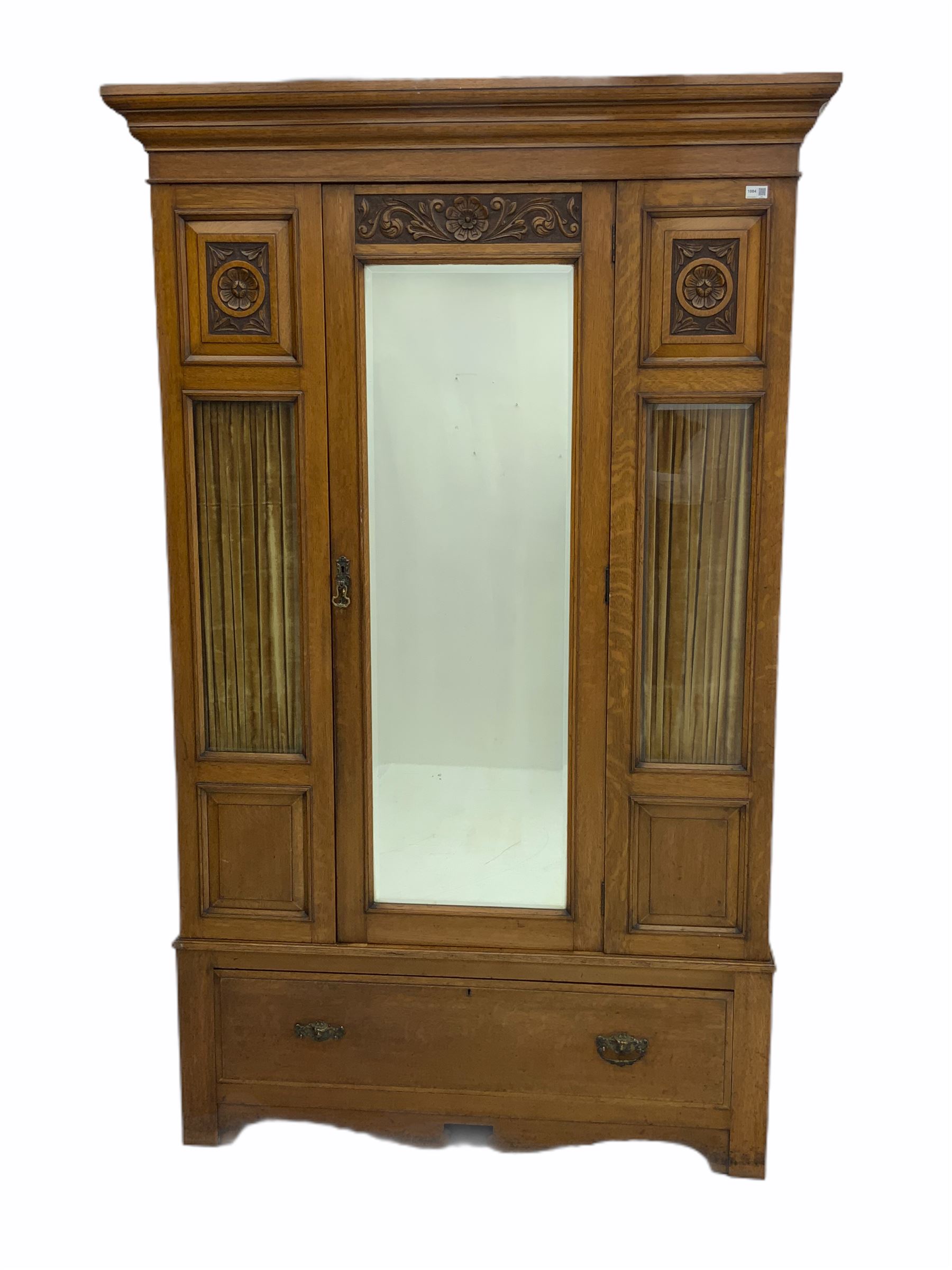 Edwardian oak wardrobe, single mirror door, glazed panels with decorative curtains behind, single drawer to base