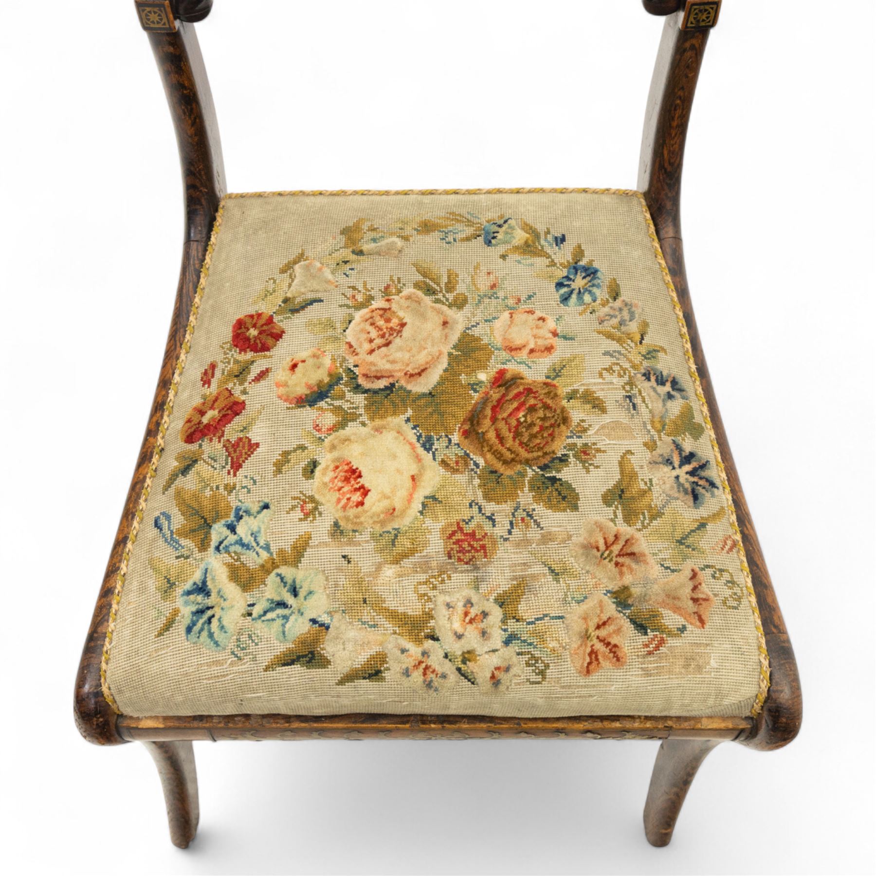 William IV X-frame rosewood stool with upholstered drop-in seat and a Regency simulated rosewood and brass inlaid dining chair with drop-in seat worked in floral needlepoint, W43xD43xH43cm & W46xD40xH79, (2)