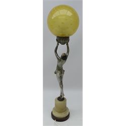  Art Deco silvered spelter table lamp modelled as a lady dancer holding a globular glass shade below a fluted mount on alabaster base, H63cm    