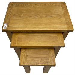 Oak television stand (W90cm, H48cm, D44cm); and nest of three tables (68cm x 44cm, H55cm)