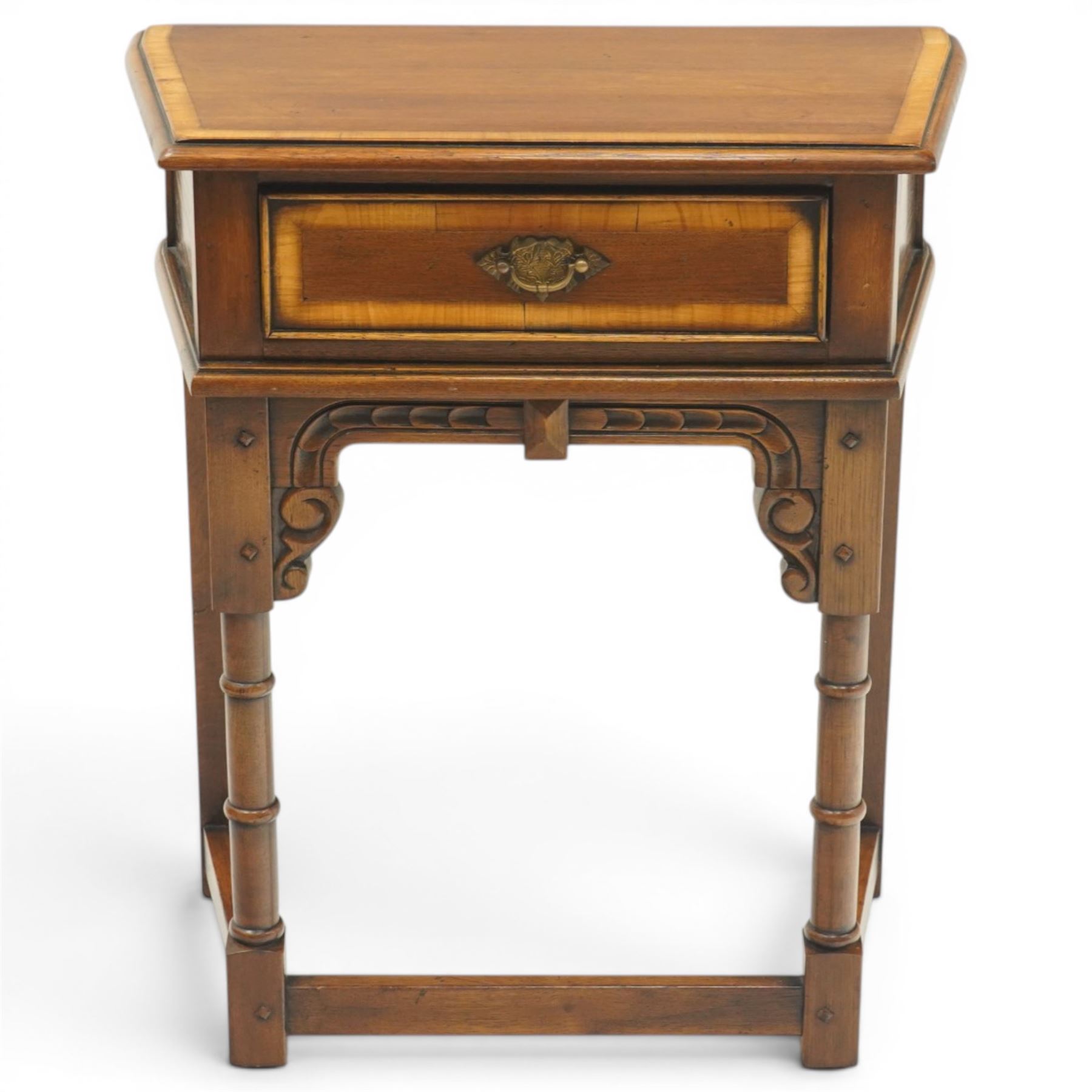 Titchmarsh & Goodwin style oak side table, the moulded top over one drawer with brass drop handle, raised on turned legs joined by a stretcher