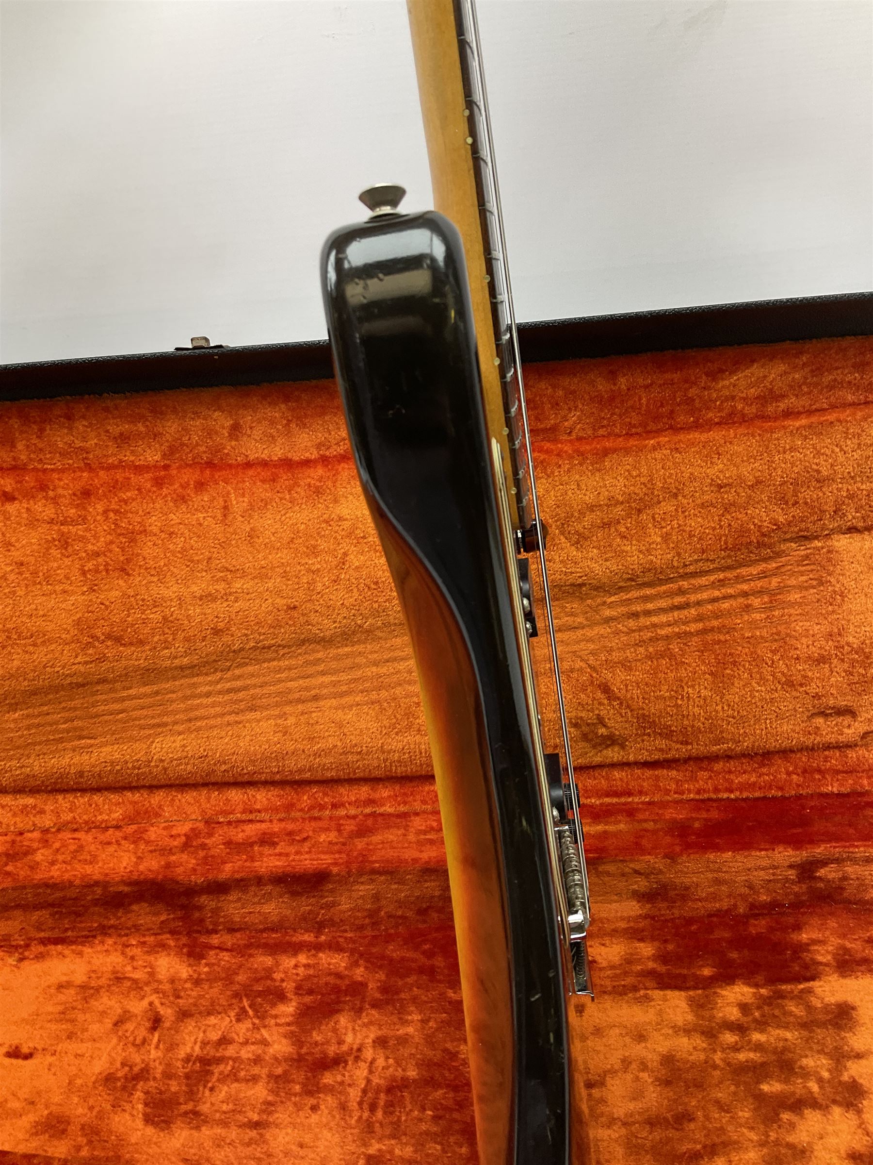 Fender three-tone Sunburst 12-string electric guitar c1965/6 Fullerton USA, with alder body and maple neck, the Indian rosewood fretboard with twenty-one frets and pearloid dot markers, fender electric XII bridge, F-stamp tuners (non-original), two split single coil pick-ups, master volume and tone and four-way switch, serial no.129730, L108cm; in original Fender case bearing label for Rivington Guitars New York with copy of original invoice; together with GuitarKes set-up and service certificate dated October 2021
