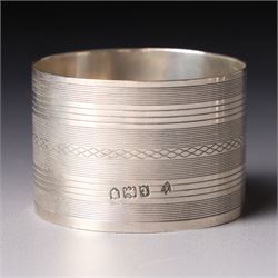 Pair of late Victorian silver napkin rings with engraved decoration Birmingham 1899 and seven other silver napkin rings