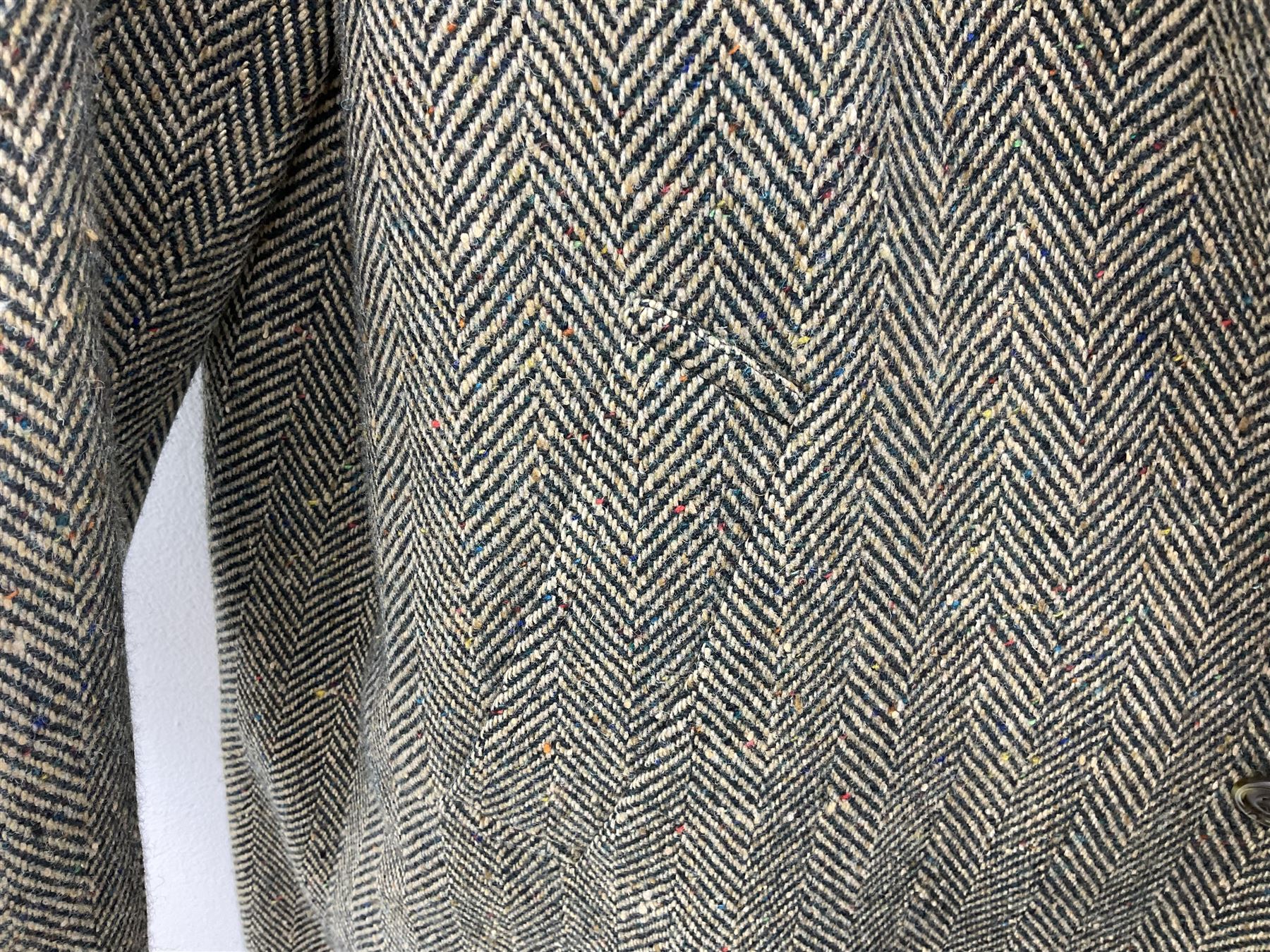 Men's Aquascutum lambs wool herringbone tweed coat with silk lining, 46 Reg, together with a further Men's Aquascutum grey wool duffle coat, with cheque lining and horn buttons, 46