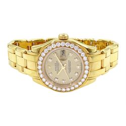 Rolex Oyster Perpetual Datejust Pearlmaster ladies 18ct gold automatic wristwatch, Ref. 69298, Serial No. T293223, champagne dial with diamond hour markers and diamond set bezel, on original 18ct Pearlmaster bracelet with fold-over clasp, with papers