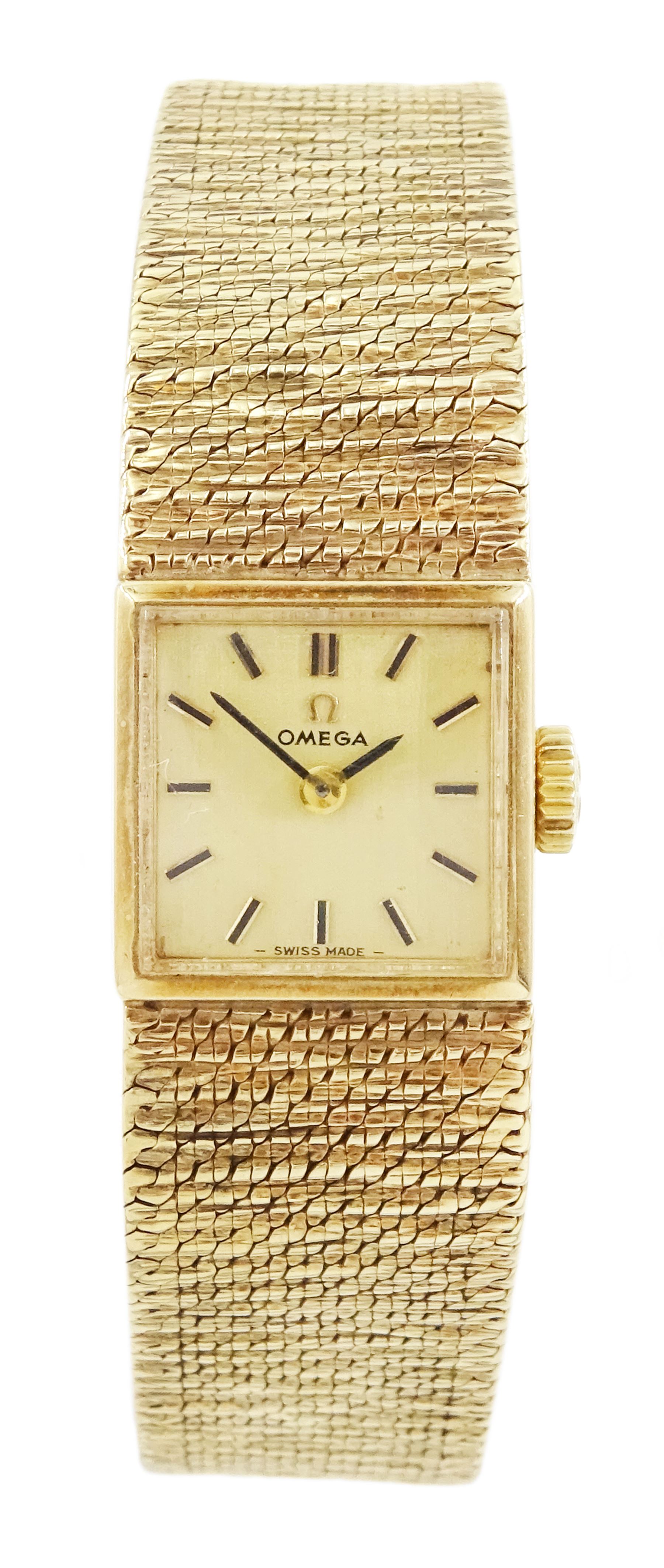 Omega ladies 9ct gold manual wind wristwatch, champagne dial with baton hour markers, on integral 9ct gold bracelet, London 1956