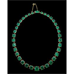 Late 19th/early 20th century gold green paste rivière necklace, the graduated square mixed-cut pastes in pinched claw open-backed settings
