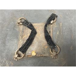 Indian black lacquered hide shield/dhal, of circular convex form fitted at its centre with four pierced iron bosses, each of hemispherical form with wide brims, the bosses corresponding on the inside with four iron rings for enarmes D53.5cm