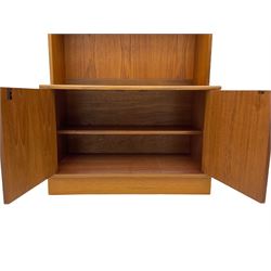 G-Plan teak two sectional modular wall display cabinet, fitted with sliding glass doors, double cupboard and three drawers