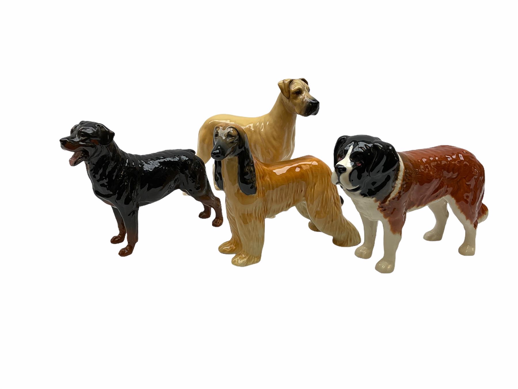 Beswick figures, comprising Afghan Hound 2285, St Bernard 'Corna Garth Stroller' 2221, Rottweiler 3056, Greatdane 'CH Ruler of Ouborough', Fox, Elephant, and dappled grey type horse. 
