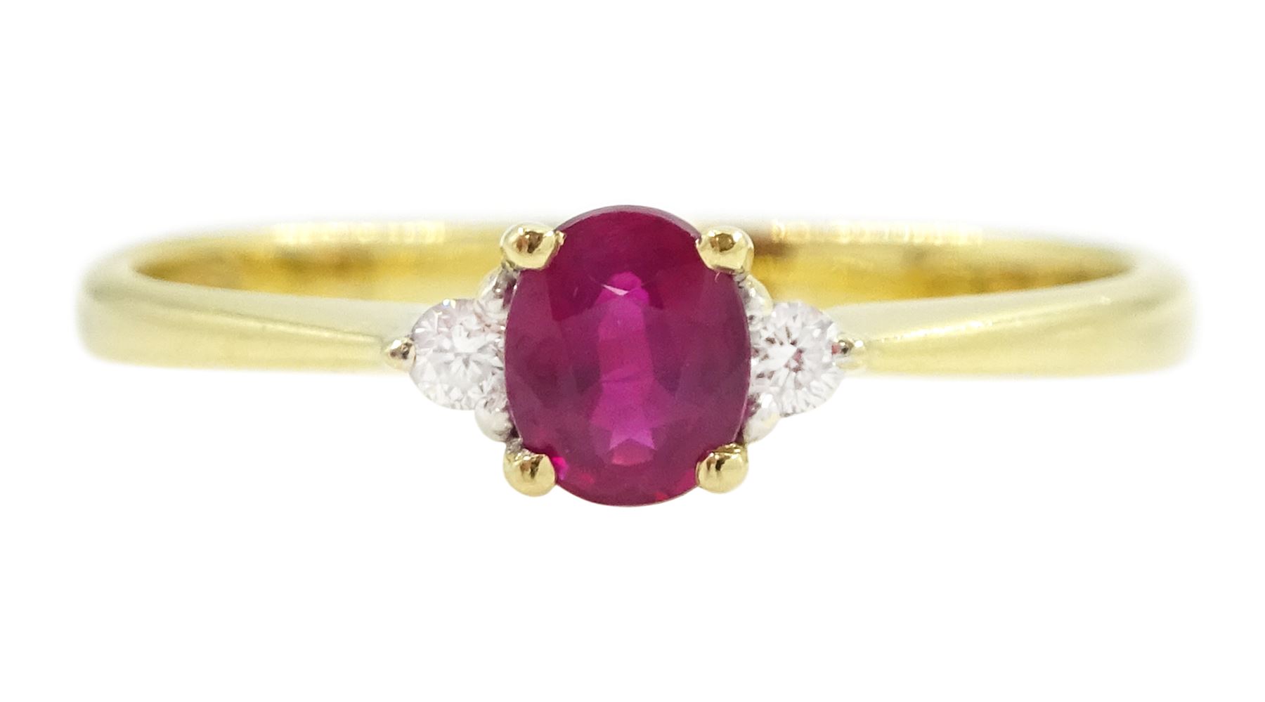 18ct gold three stone oval cut ruby and round brilliant cut diamond ring, stamped 750, ruby approx 0.30 carat
