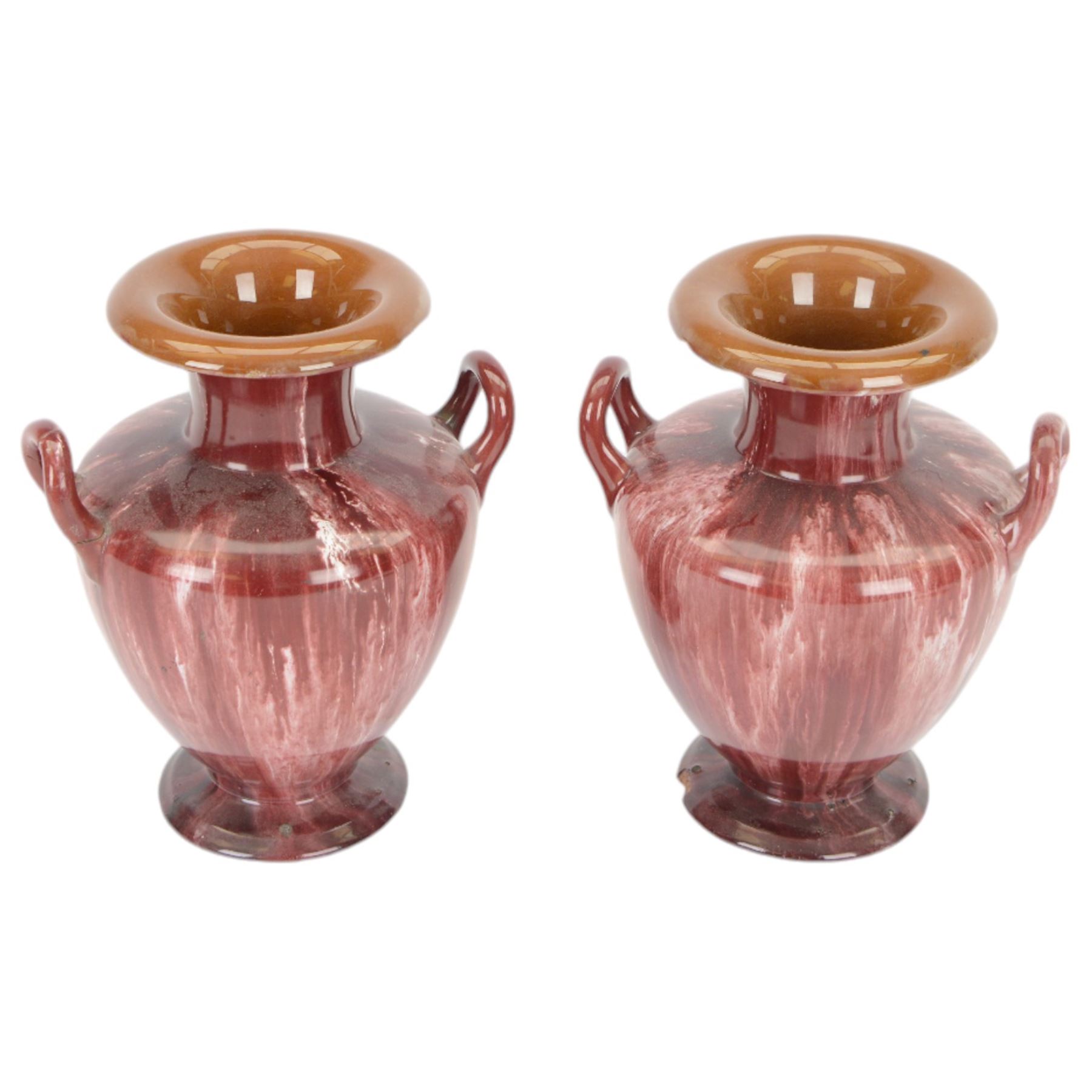 Linthorpe Pottery, pair of twin handled vases, with a purple glaze, H20cm