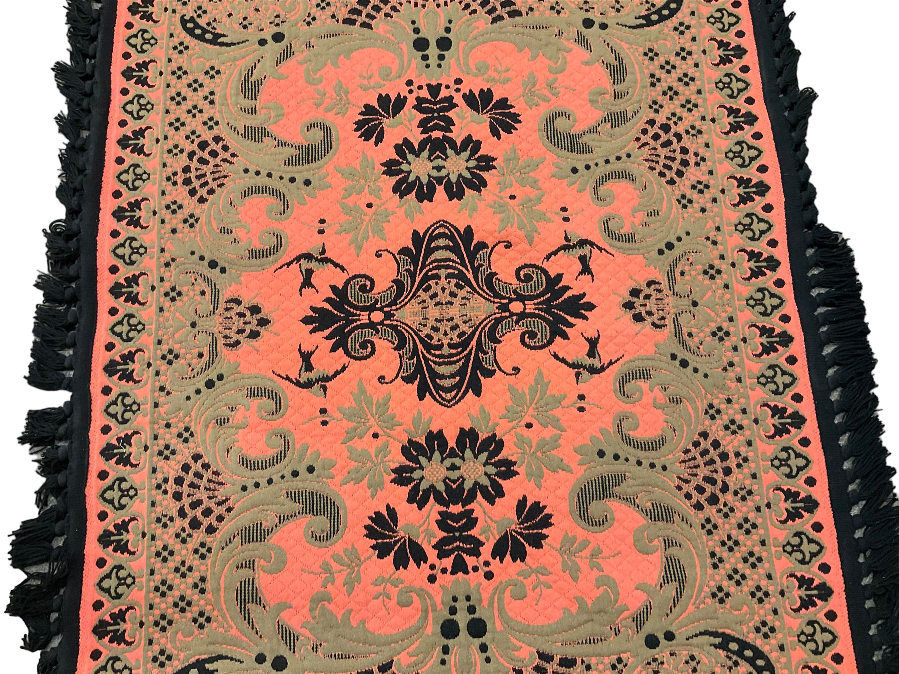 Persian Tabriz design fushia ground rug or wall hanging, central foliate medallion surrounded by rinceaux patterns, border decorated with stylised palmettes and large fringe 