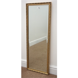  Rectangular bevel edge wall mirror in two tone gilt swept frame (93cm x 68cm), and another rectangular bevel edge wall mirror in gilt frame (35cm x 95cm)  