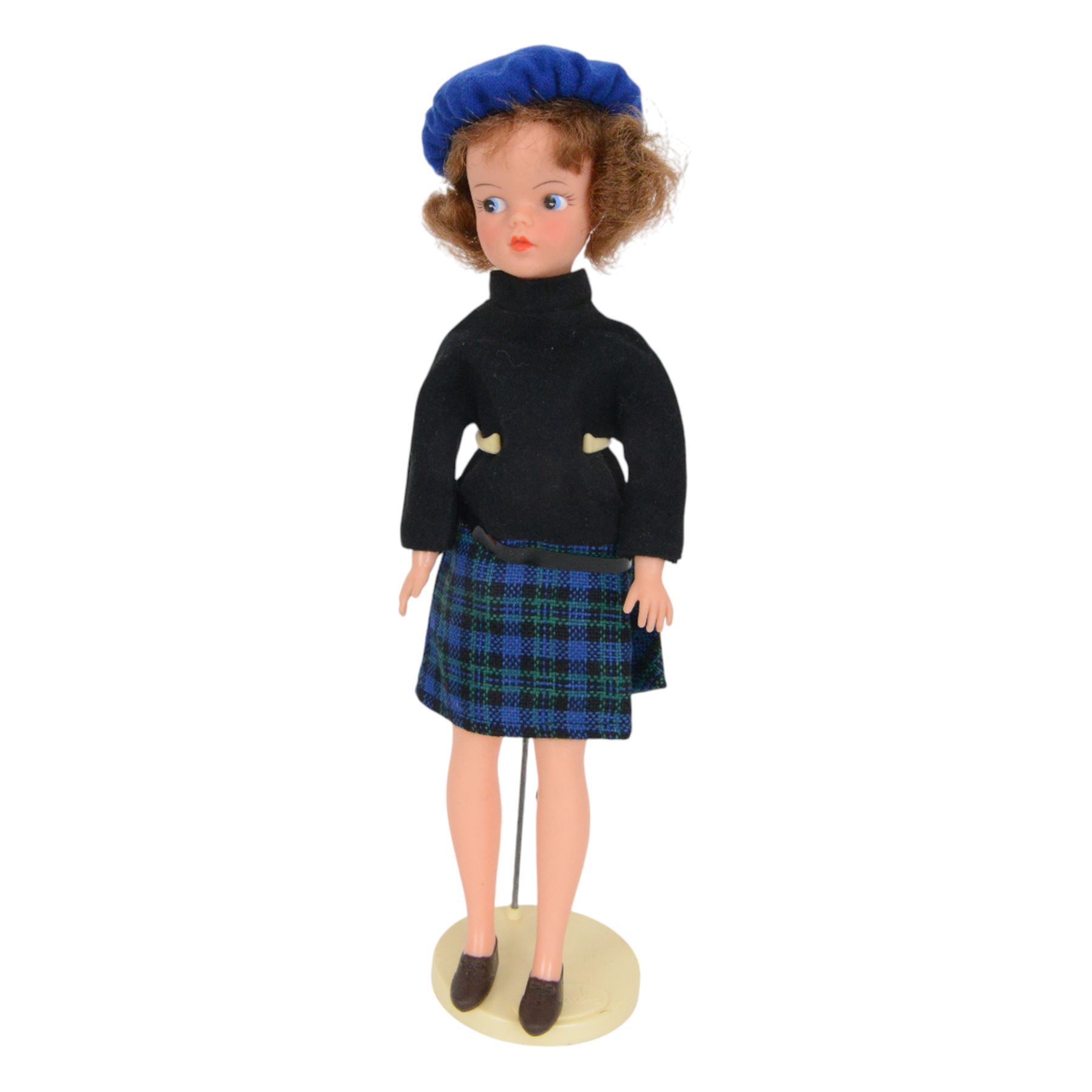 1963/4 Pedigree Sindy doll, with brunette hair, red pursed lips and blue eyes, stamped Made in England to back of head, dressed in Sindy Lunch Date outfit, with a collection of mostly Pedigree Sindy clothes and other accessories