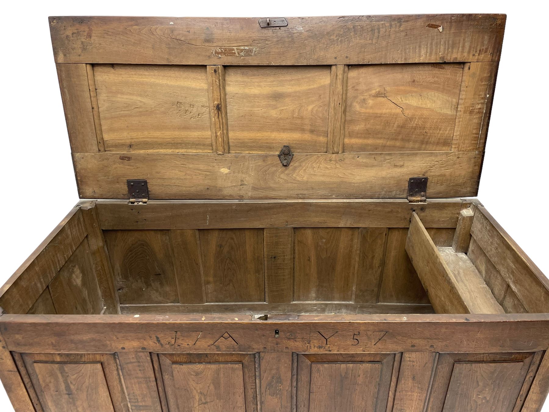 Georgian oak mule chest, moulded rectangular hinged lid over quadruple fielded panel front, the frieze inscribed '17 A Y 57', fitted with two drawers, panelled ends and back, on stile supports