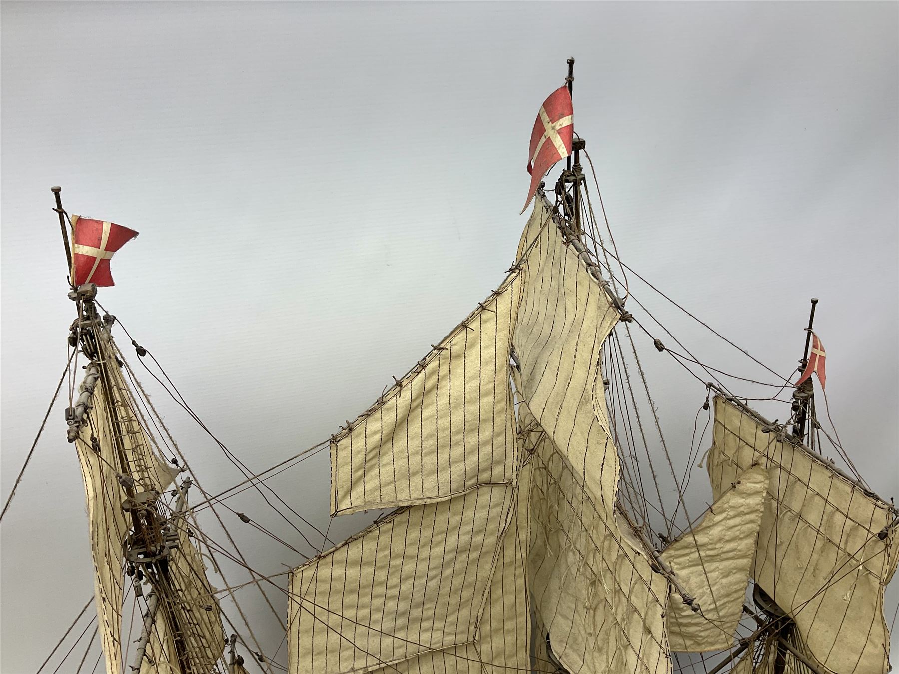 Wooden model of the three mast sailing ship with full rigging, on a wooden display base, H95cm, L110cm