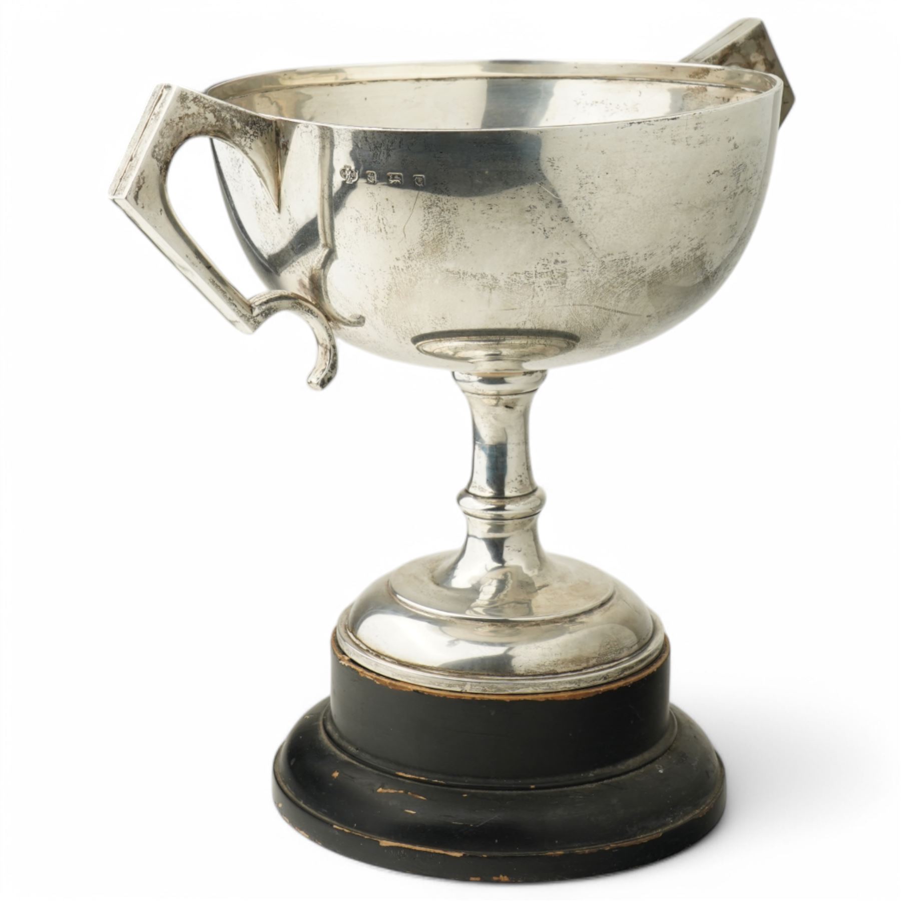  'Bramham Moor Hunt Point to Point Steeplechases' - A two handled silver cup presented by H.R.H. The Princess Royal on ebonised plinth D23cm x H23cm excluding plinth, Birmingham 1931 Maker William Hutton & Sons Ltd