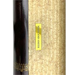 Maitland-Smith - four drawer chest in the form of a stack of leather-bound books, the top drawer with metal label inscribed 'Maitland-Smith', on turned feet