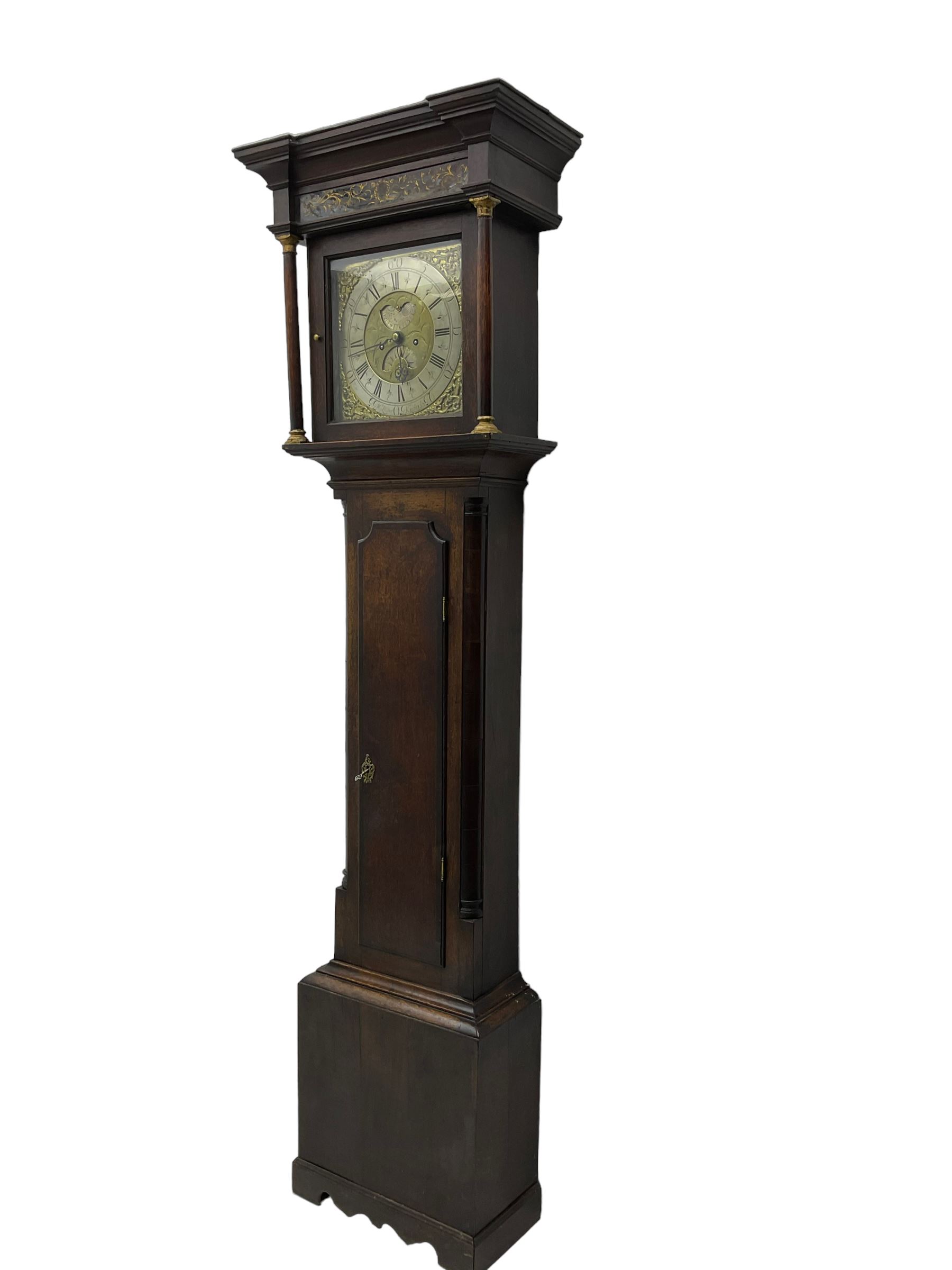 William Lister (II) of Keighley – 8-day 18th century oak cased longcase clock c1760, hood with a break front flat topped pediment and eglomise  frieze beneath, square hood door flanked by matching pilasters with gesso capitals, trunk with quarter columns and long trunk door with a flat top and convex shoulders, square plinth with a decorative skirting, 12” brass dial with rococo spandrels, engraved dial center, silvered chapter with Roman numerals, five minute Arabic’s, half hour markers and minute track, semi-circular apertures with engraved calendar and moon phase/lunar age discs, original blue steel fretted hands, four pillar rack striking movement with a recoil anchor escapement, striking the hours on a bell. With pendulum, weights and key.
The Lister family were a prolific family of clockmakers working in the West Riding of Yorkshire during the 18th century. Working in various locations including Halifax, Keighley and Luddenden.
William Lister (I) is recorded as working in Keighley from 1715-37 and his son William (II) from 1735-1785.
