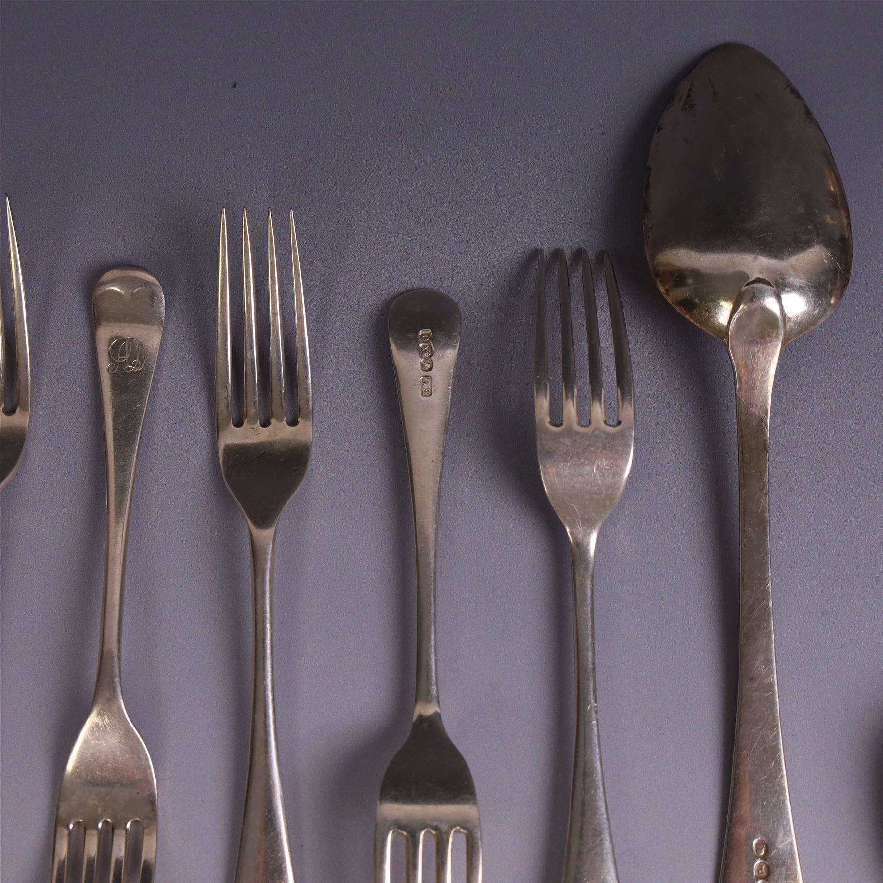 Three silver Old English pattern table spoons, including George III pair, and a set of six 1930s silver forks, all with engraved initials, all hallmarked