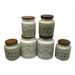Six Hornsea storage jars, comprising two large examples marked Flour, and Biscuits, a smaller unnamed example decorated in the same pattern, and a set of three marked Tea, Coffee, and Sugar, in one box
