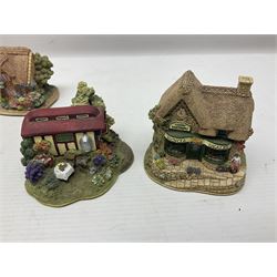 Eighteen Lilliput Lanes, including The Penny Farthing, The Pigsty, Borrowdale School, Fairy Cake Tearoom, An Apple a Day,Ladybird Cottage etc, all with original boxes 