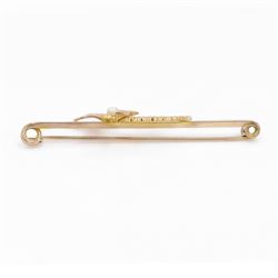 Early 20th century rose gold dragonfly bar brooch, set with a single white / cream pearl, stamped 9ct