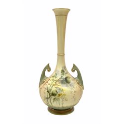 Royal Worcester blush ivory vase, the bulbous body with twin flying handles and tall tapering neck, hand painted with flowers, shape number 1761, 24cm high. 