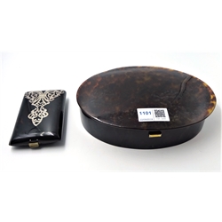  Early 20th century oval tortoiseshell jewellery box, silver hinges by Charles Henry Dumenil London 1916 and a silver mounted tortoiseshell cigar case both with sprung brass catches  