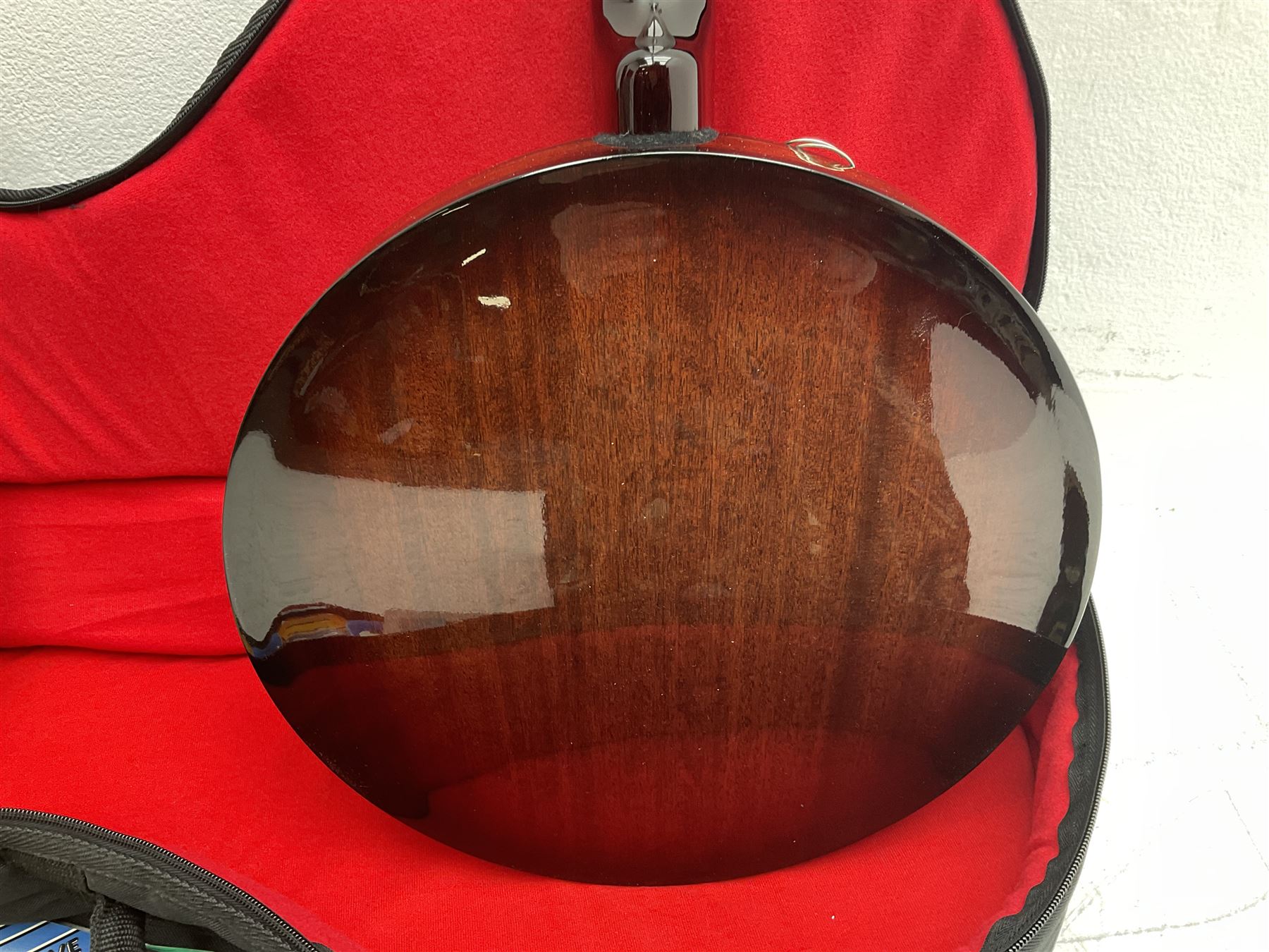 Rally five-string banjo with mahogany solid back L101cm in soft carrying case; and Brunswick Model BF200 acoustic guitar L103cm; with small quantity of instructional DVDs and booklets